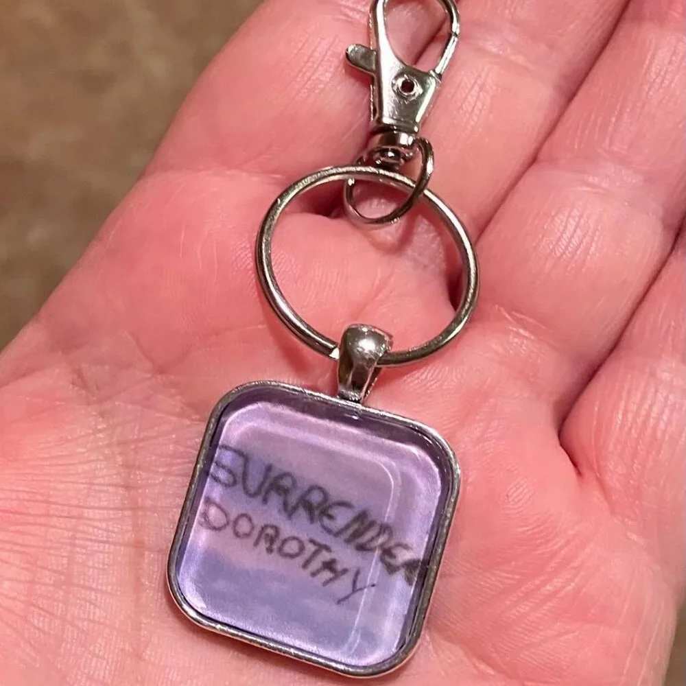 (2/$12, 4/$20) Surrender Dorothy Keychain